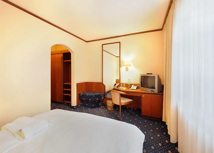 Отель Ambassador Parkhotel Мюнхен